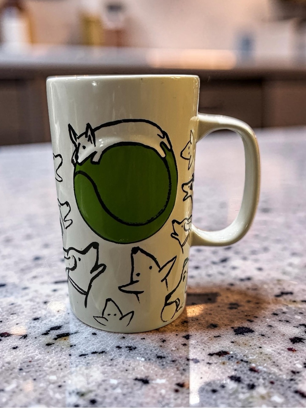 Starbucks Cream Ceramic Mug with Green Tennis Ball Fox Design